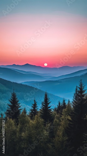 Sunset Over a Mountain Range with a Forest in the Foreground