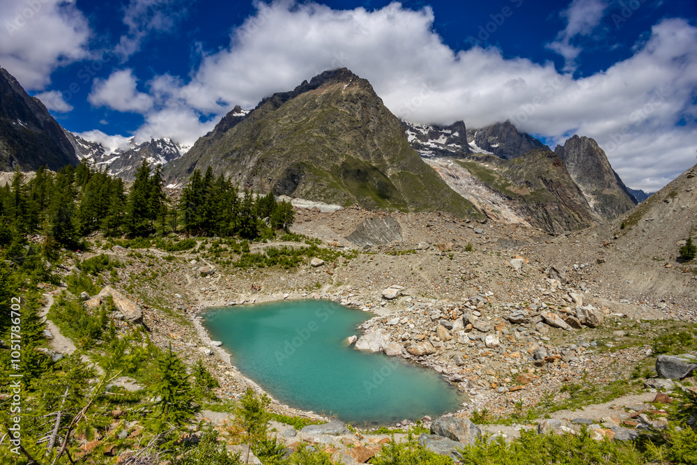 Obraz premium Chamonix rocky granite mountain peaks in french Alps around Mont Blanc summit in Chamonix valley. Scenic landscape of iconic alpine summits the legends of mountaineering and alpinism