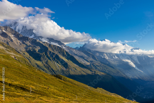 Chamonix rocky granite mountain peaks in french Alps around Mont Blanc summit in Chamonix valley. Scenic landscape of iconic alpine summits the legends of mountaineering and alpinism