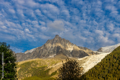 Chamonix rocky granite mountain peaks in french Alps around Mont Blanc summit in Chamonix valley. Scenic landscape of iconic alpine summits the legends of mountaineering and alpinism