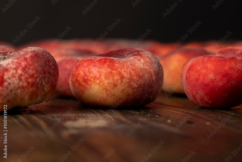a pile of ripe washed peaches on the table a pile of ripe washed peaches on the table