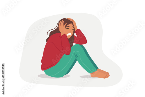Upset woman is crying, sitting on floor and clutching head, due to panic attack or personal burnout. Upset girl experiences stress and depression because of conflict with boyfriend.