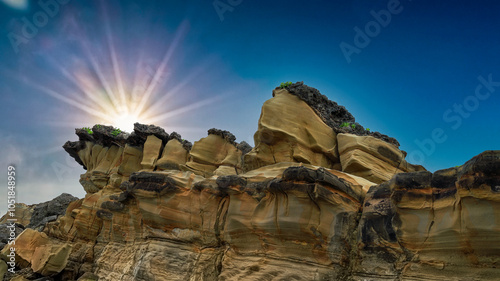 Obraz na płótnie Stunning amazing rocky coast view at sunset ,beautiful bay,rock, sun rays,blue sky in Xiaoyeliu Geopark,Taitung,Taiwan For branding,calendar,postcard,screensaver,wallpaper,poster,banner,cover,website. w salonie