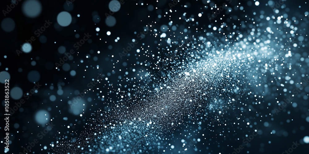 Obraz premium Snow falling over a dark background resembling festive silver glitter 