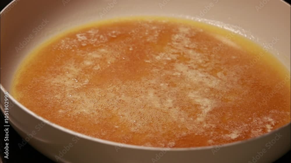 Melting Sugar and Butter in a Pan - Close-Up Melting Sugar and Butter in a Pan - Close-Up