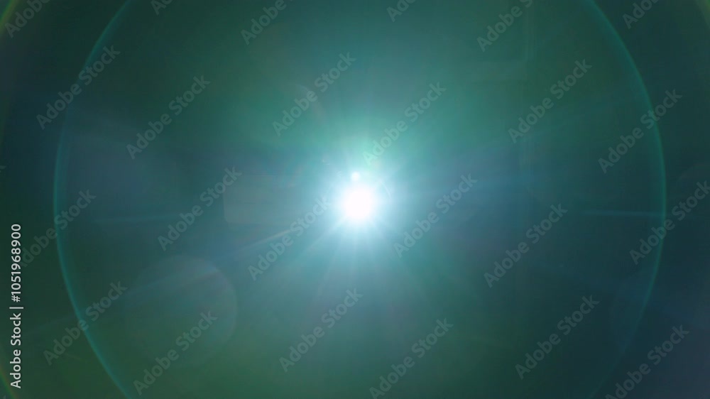 The video projector lights up and dazzles us with cold-coloured flashes of light