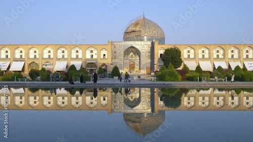 Impressive Sheikh Lotfollah Mosque reflected in the water, Isfahan