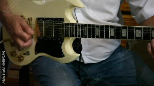 person playing guitar