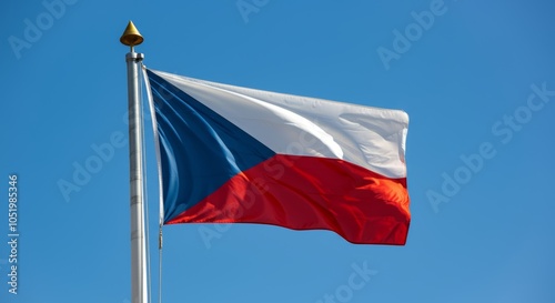 Czech republic national flag waving against clear blue sky. photo