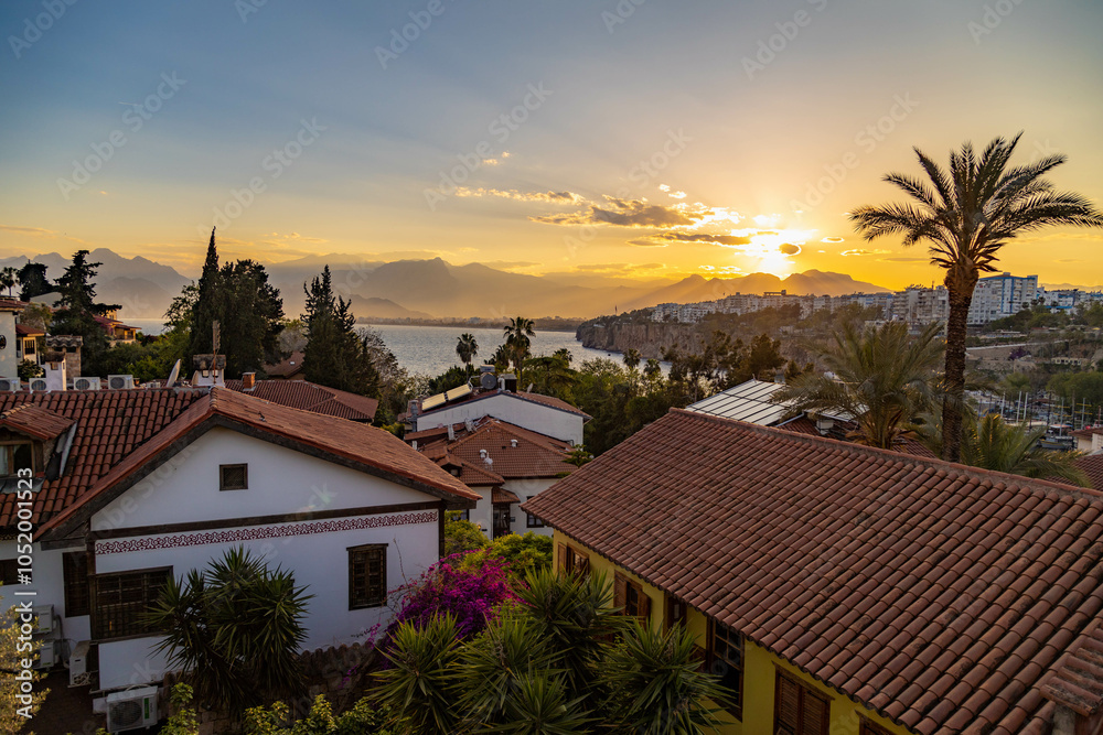 Fototapeta premium Panoramic view of old town (Kaleici) and sea of Antalya at sunset , Turkey 