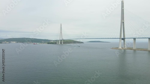 Russian bridge in the city of Vladivostok. Aerial view -  2024 Vladivostok, Russia. sunny weather Primorsky Krai. Editorial use