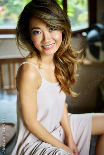 Beautiful young woman posing in craft workshop