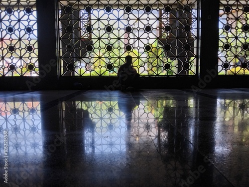 silhouette of a person in the window
