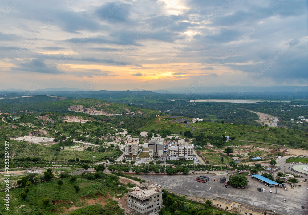 Obraz premium Scenic Aerial view of Mountains with dramatic sunset Cloudy evening Sky