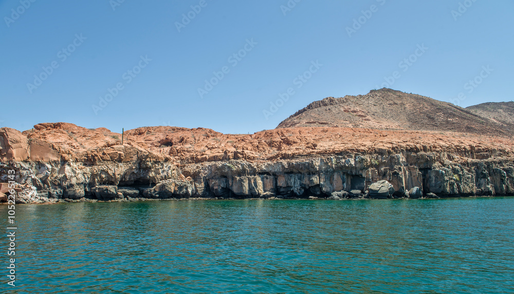 Rocky mountain formations on ESPIRITU SANTO island, on the Baja California peninsula, Baja California Sur state, Sea of Cortes, MEXICO. Nature of The Baja Rocky mountain formations on ESPIRITU SANTO island, on the Baja California peninsula, Baja California Sur state, Sea of Cortes, MEXICO. Nature of The Baja