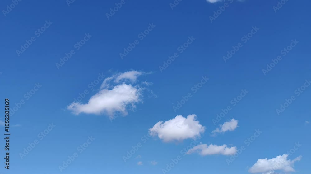 Very dense white small clouds at midday