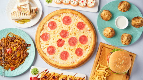 Different dishes - pizza, burger, manti, lagman, doner, sushi. Top view on a light background