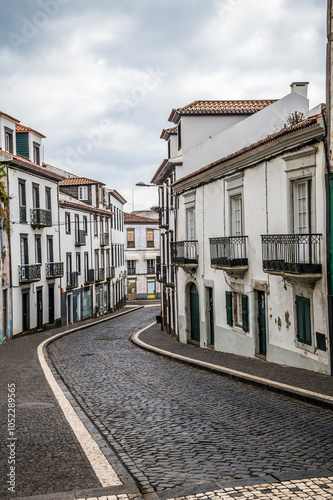 A view down a tiled street in Ponta Delgada on the island of San Miguel in the Azores in summertime