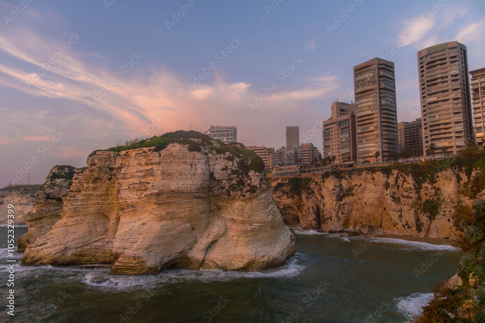 Fototapeta premium Beirut city with famous Pigeons' Rock (Raouche rocks) on the Mediterranean sea coastline with modern architecture in Lebanon. 
