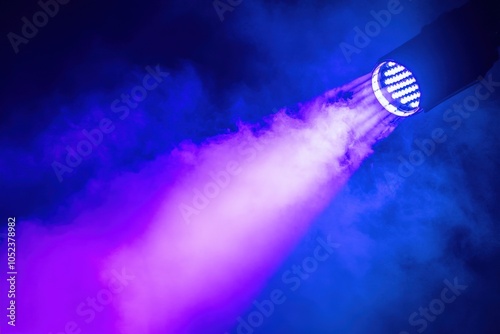 Strobe Lights at Stage Concert. Featuring Lights in Purple, Blue, and White with Atmospheric Smoke