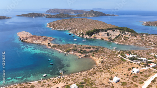 Obraz na płótnie Aerial drone photo of paradise island with crystal clear turquoise beaches and main seaside town of Arki or Arkoi, Dodecanese, Greece w salonie
