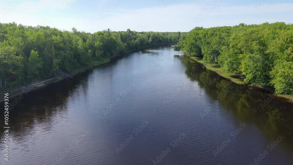 Flying over a very winding river and forest in Northern Minnesota near the border of Canada Flying over a very winding river and forest in Northern Minnesota near the border of Canada