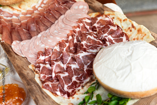 Vassoio di salumi misti e crema di formaggio, antipasti italiani  photo