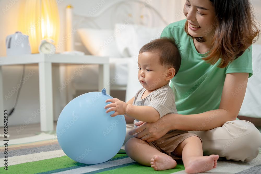 Asian baby and woman doing lifestyle activities together at home. Asian baby and woman doing lifestyle activities together at home.