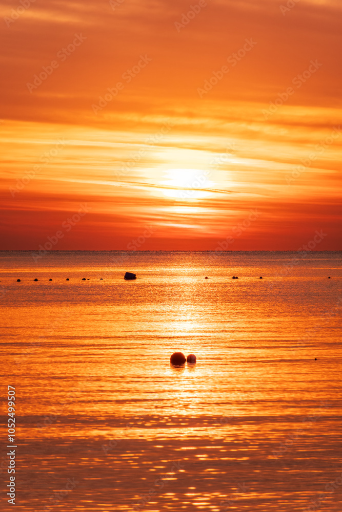Beautiful red and orange sunrise over the sea. Beautiful red and orange sunrise over the sea.