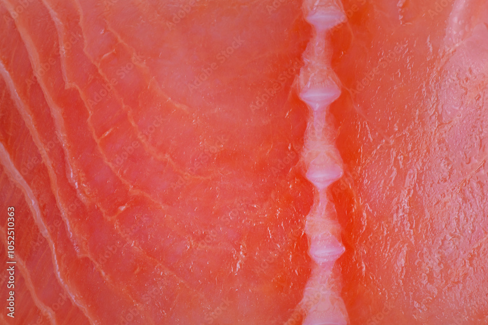 Fototapeta premium Red salmon fish as background macro photo.