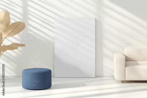 A minimalist living space with a medium blank canvas on a white wall 