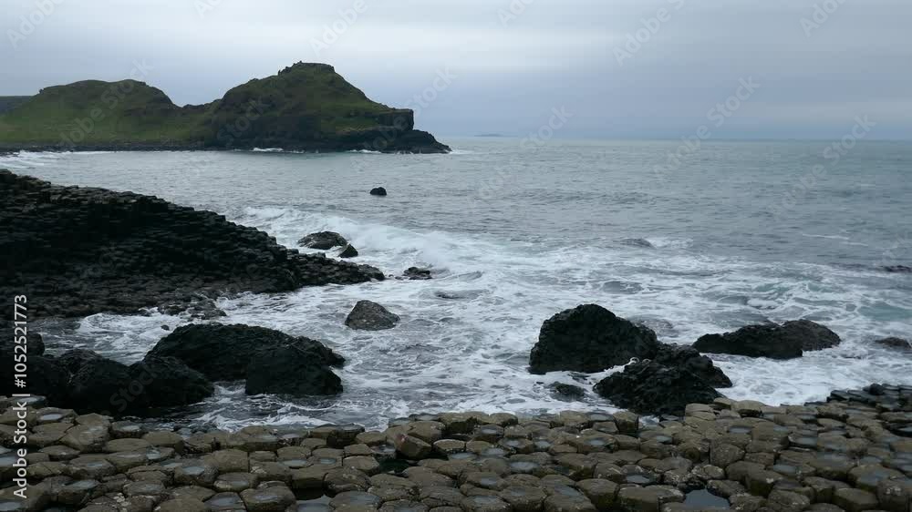 Giant's Causeway Coastal View, Northern Ireland, 4K Footage of Rock Formations and Waves Giant's Causeway Coastal View, Northern Ireland, 4K Footage of Rock Formations and Waves