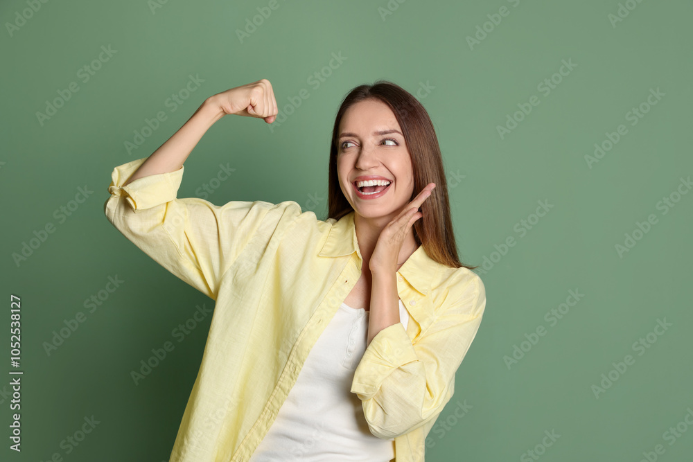 Portrait of happy winner on green background Portrait of happy winner on green background