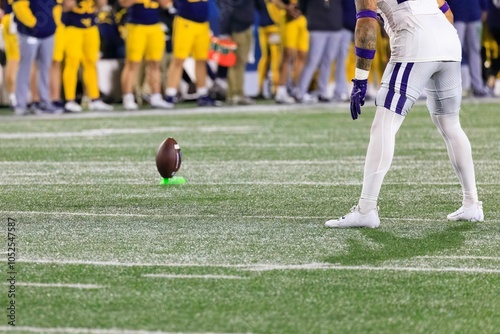 Slika na platnu Close-up of a College football kicker on the football field