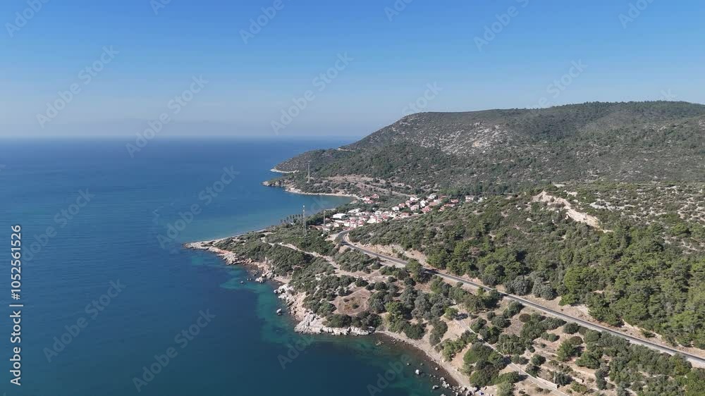 Aerial view over Ahmetbeyli coastal resort town in Menderes district of Izmir province in Turkey. Aerial view over Ahmetbeyli coastal resort town in Menderes district of Izmir province in Turkey.