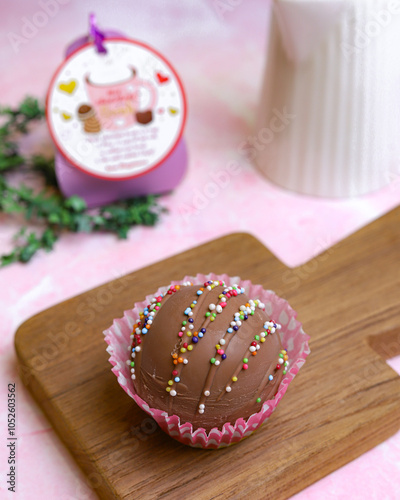 Chocolate ball cupcake with sprinkle photo