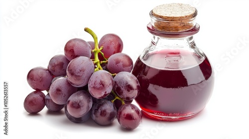 Red grape vinegar in a glass jar isolated on a white background