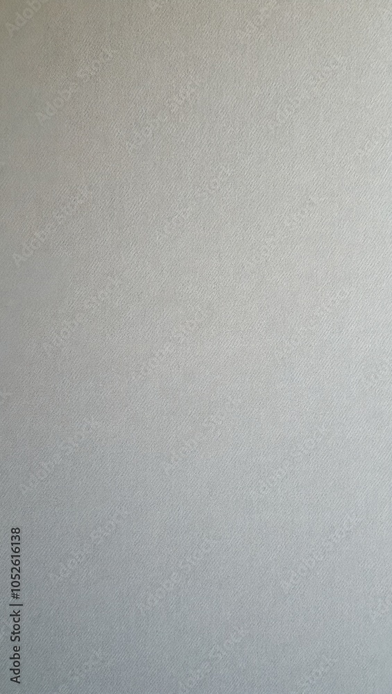 Elegant gray fabric wall with subtle woven texture Elegant gray fabric wall with subtle woven texture