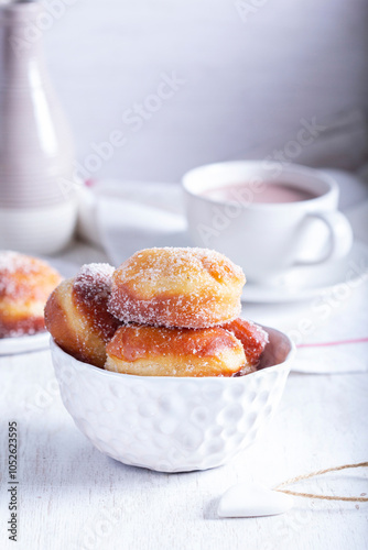 Obraz na płótnie Donuts with sugar and cinnamon served with cocoa. Traditional dessert for Carnival. w salonie