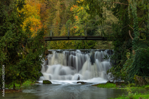 Zlaty creek and waterfall near ponds in autumn evening in Opocno town