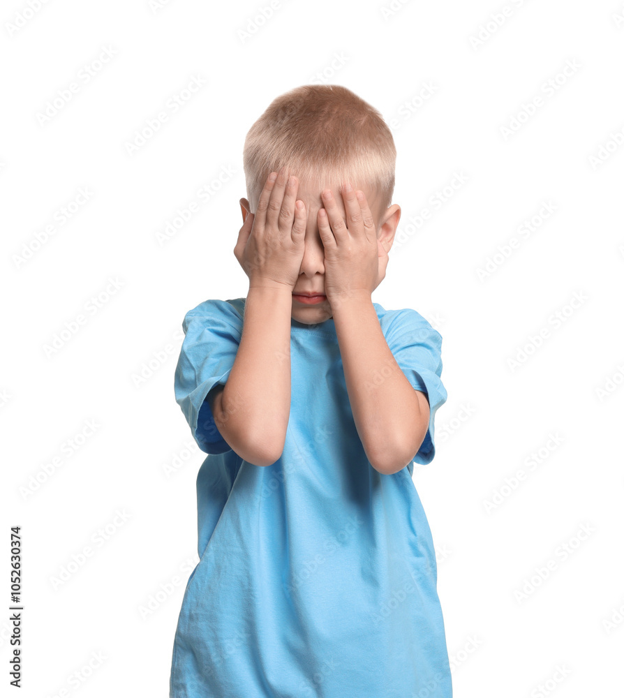 Scared little boy covering face with hands on white background Scared little boy covering face with hands on white background