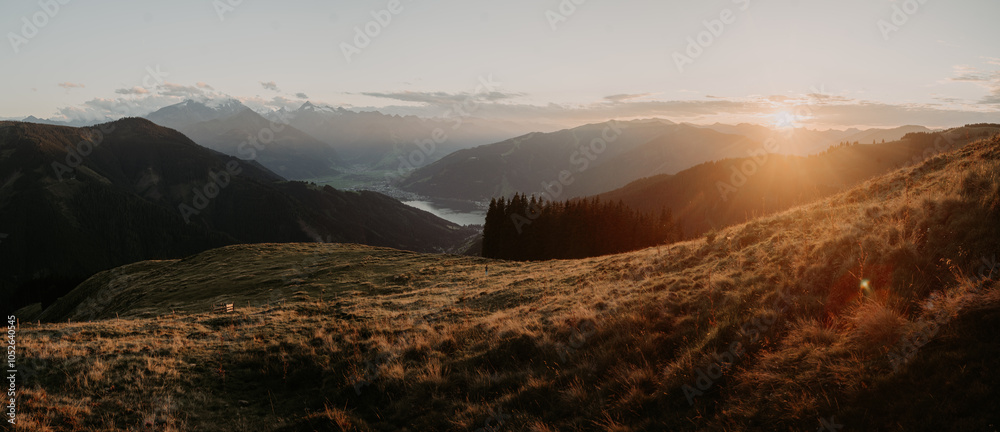 Mountain scenery in Zell am See with lake and Kitzsteinhorn at sunset, Salzburg Land, Austria