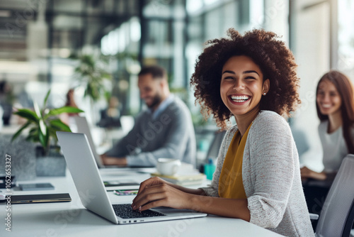 Happy Woman Smiling at Work in a Modern Office Setting