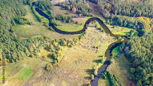 Steep bends and loops of the Merkys river, from above, Lithuania.  photo