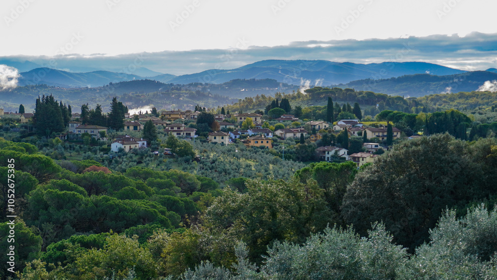 Fototapeta premium These landscapes illustrate the natural beauty of Tuscany in warm autumn colors.
