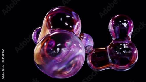 A metaball animation with liquid blobs. 3D abstract spectrum metaballs on a black background. 4K Ultra HD. A 3D animation with a seamless loop and an alpha matte.