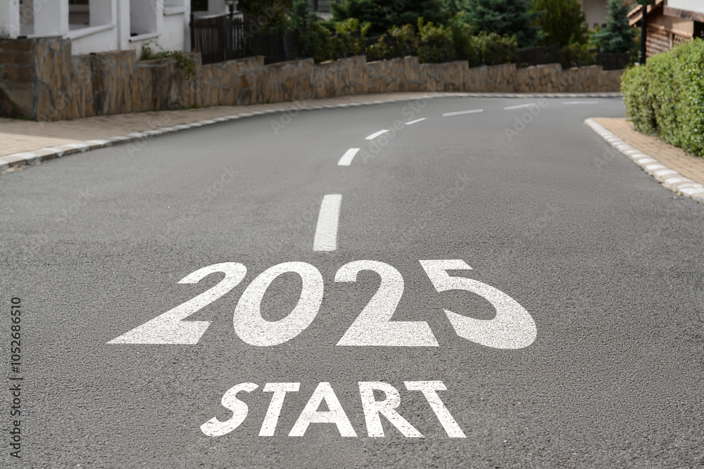 Fototapeta premium 2025 Start sign on asphalt road. Concept of new year, fresh beginning