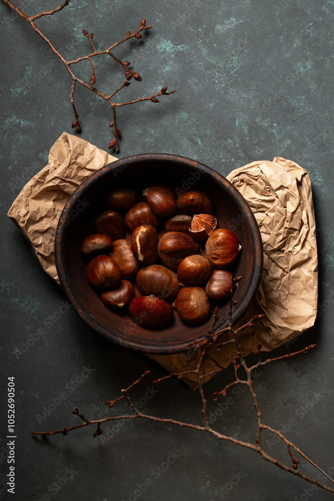 Edible chestnuts in a wooden bowl