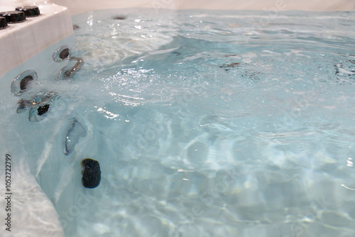 cascading high-pressure clear water jet in individual bath . photo