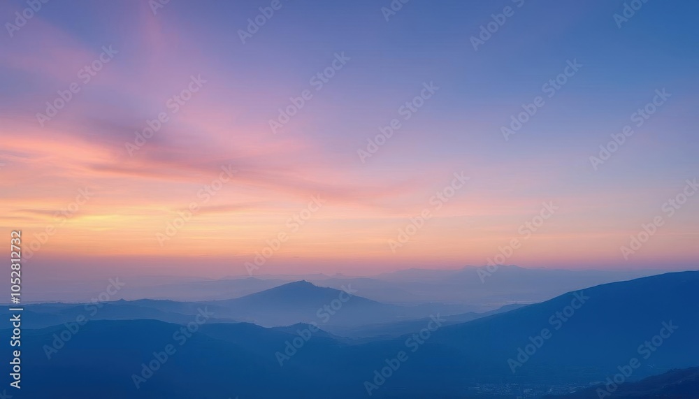 a mountain range at sunset pastel colored sunrise a mountain range at sunset pastel colored sunrise